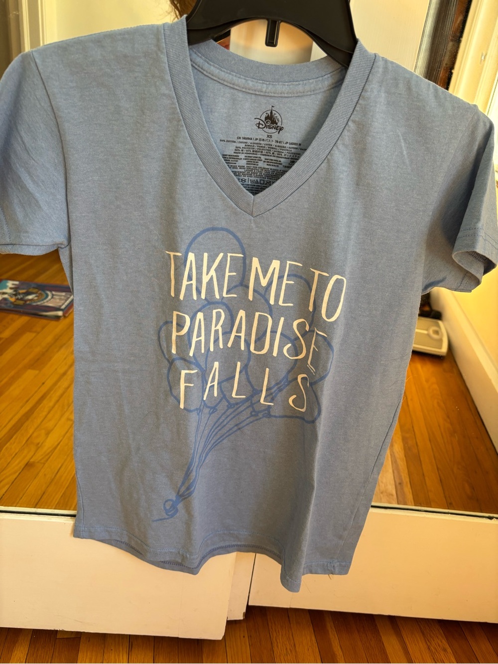 Disney Light Blue V-Neck Tee with White Text and Balloon Graphic